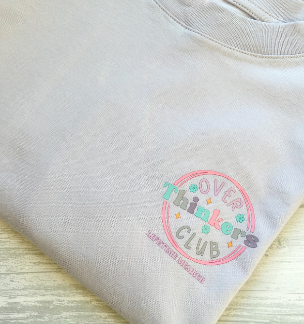 Lilac boxy style T-Shirt with Overthinkers Club logo in pastel colours