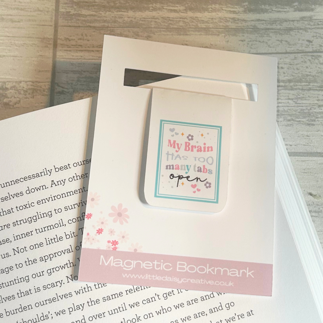White gloss magnetic bookmark with wording My Brain Has Too Many Tabs Open on display card.