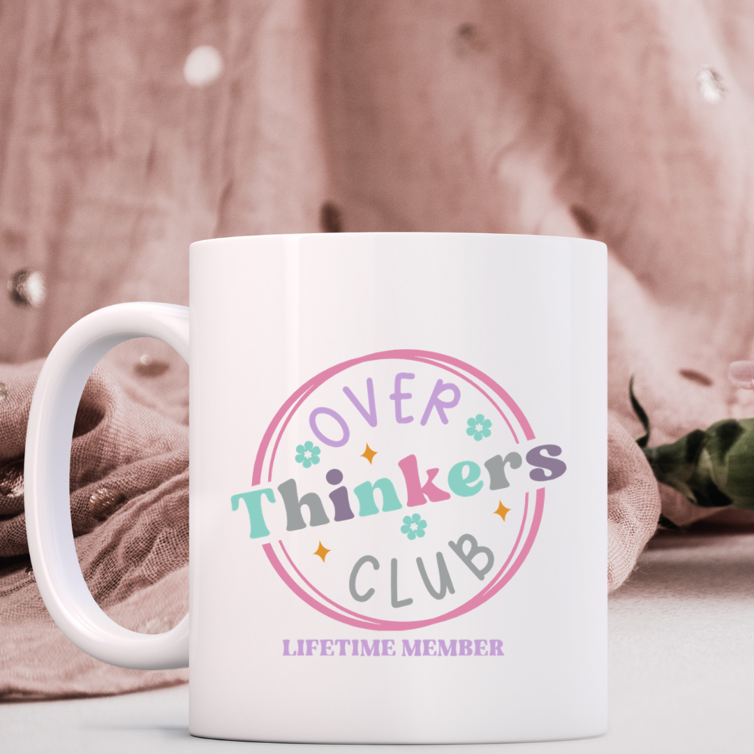 White porcelain 11oz mug with design saying Overthinkers Club Lifetime Member.