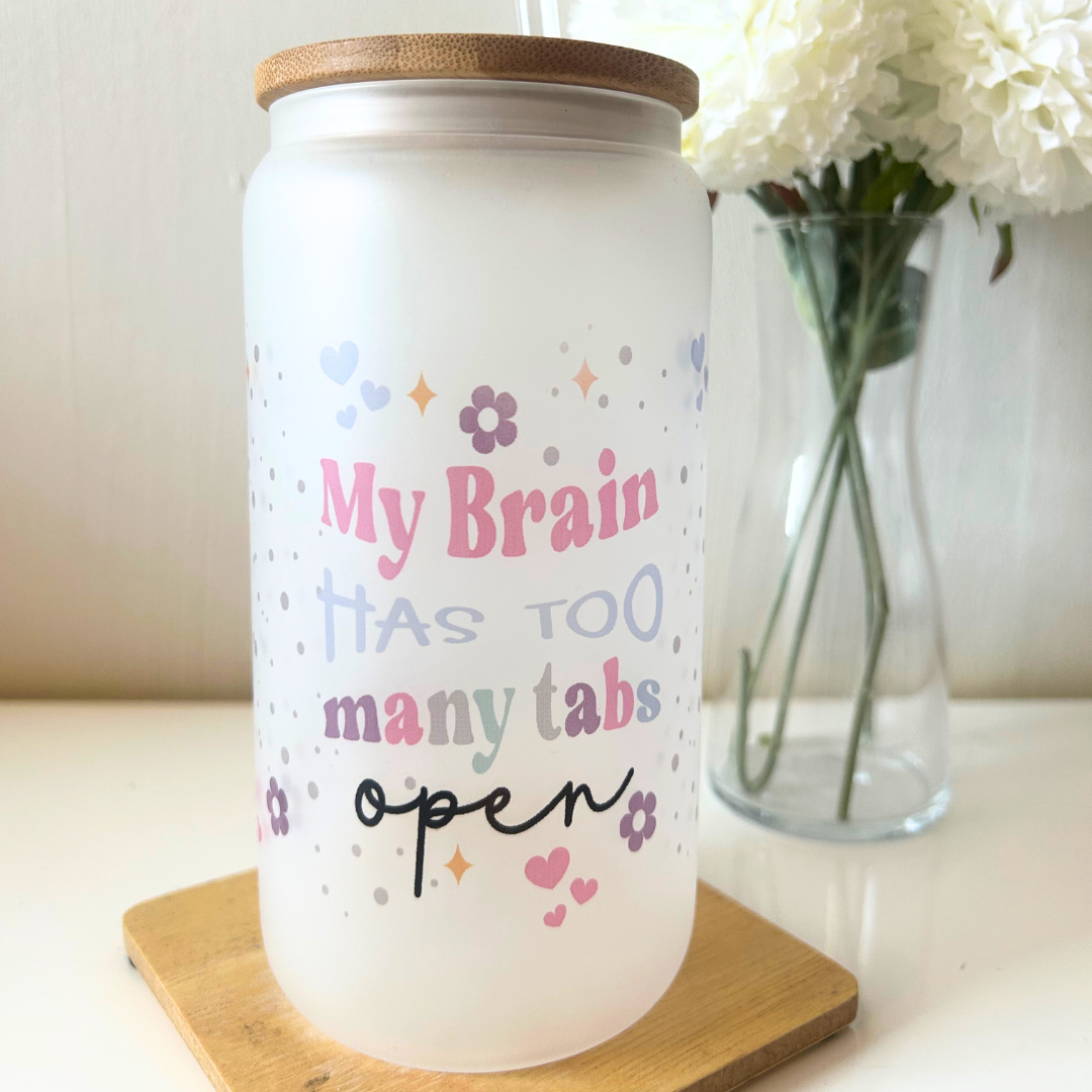 Overthinkers Club frosted glass tumbler with bamboo lid and plastic straw with design 'My Brain Has Too Many Tabs Open'.